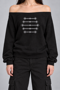 black off-shoulder sweatshirt with silver-grey military frogging across the chest, on model, front view from the collarbone down