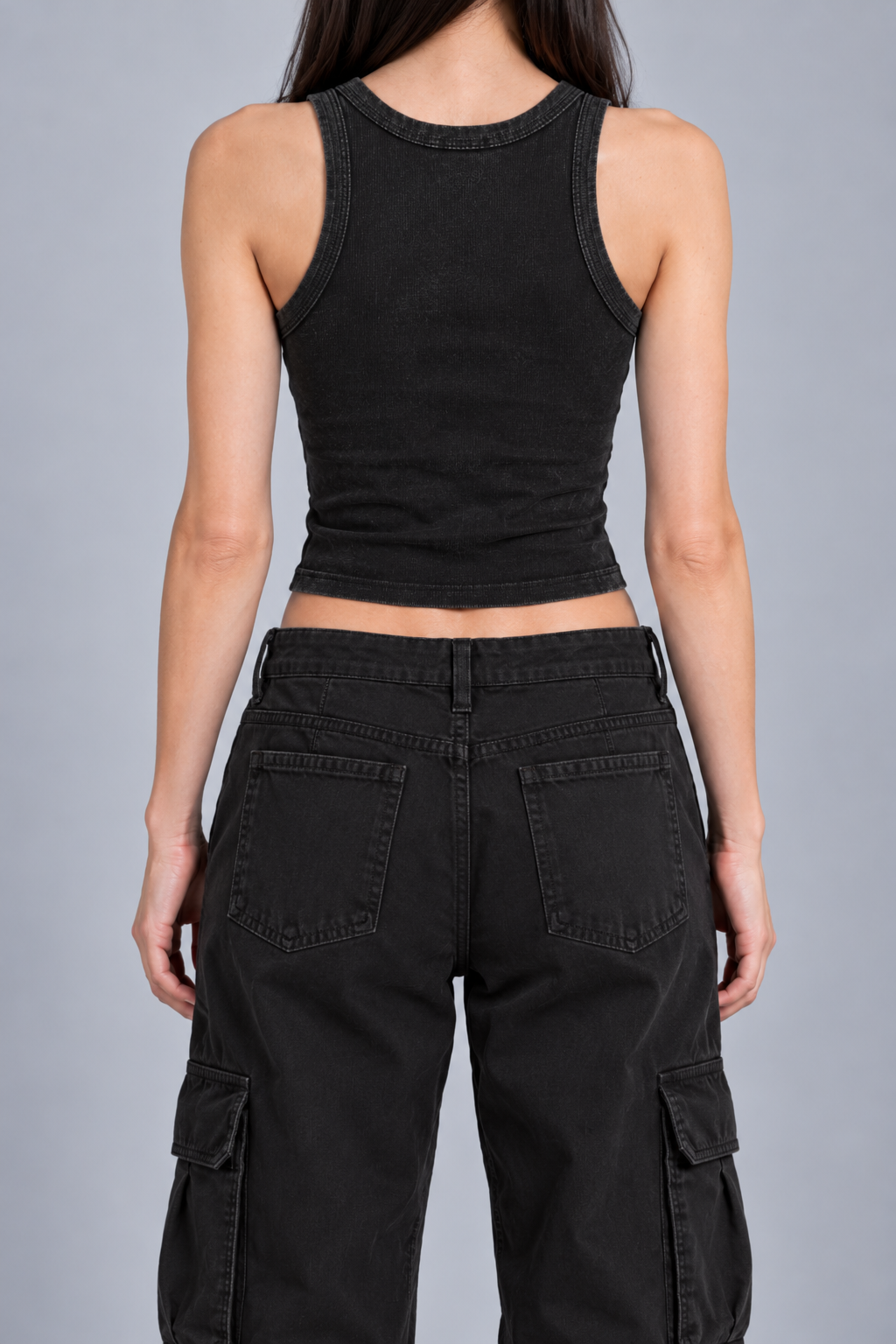 snow-washed black tank with NOT YET BURIED in tall silver-grey letters running up the front, on model, back view
