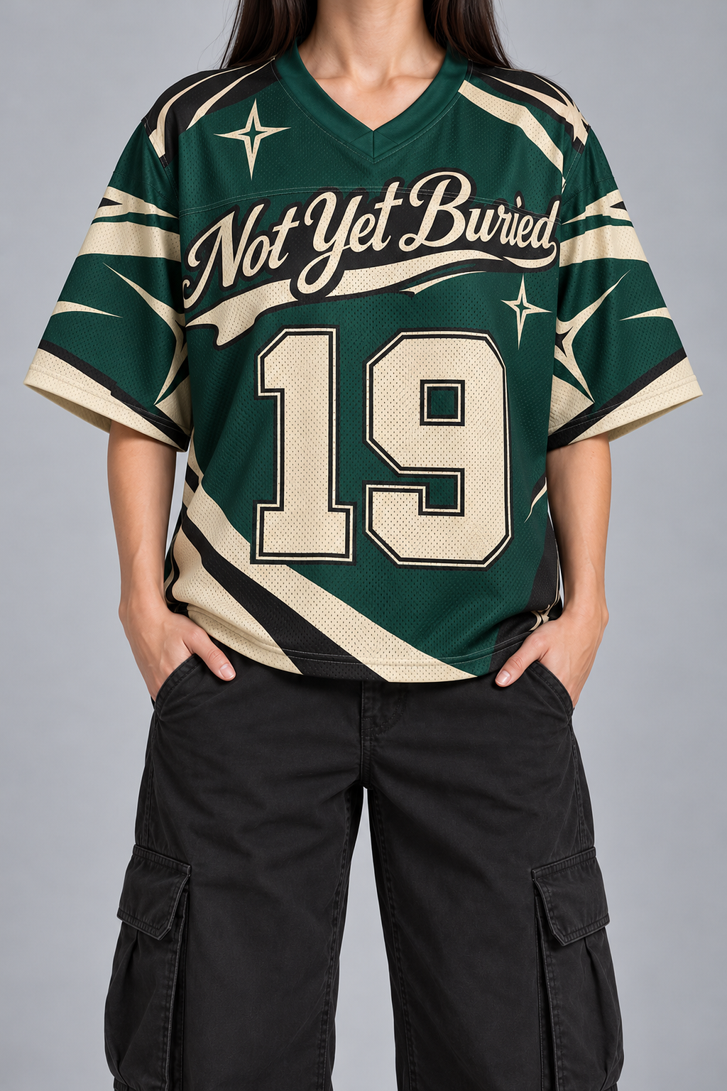 "BLIGHT" forest green and cream football jersey, worn, front view, hands in pockets