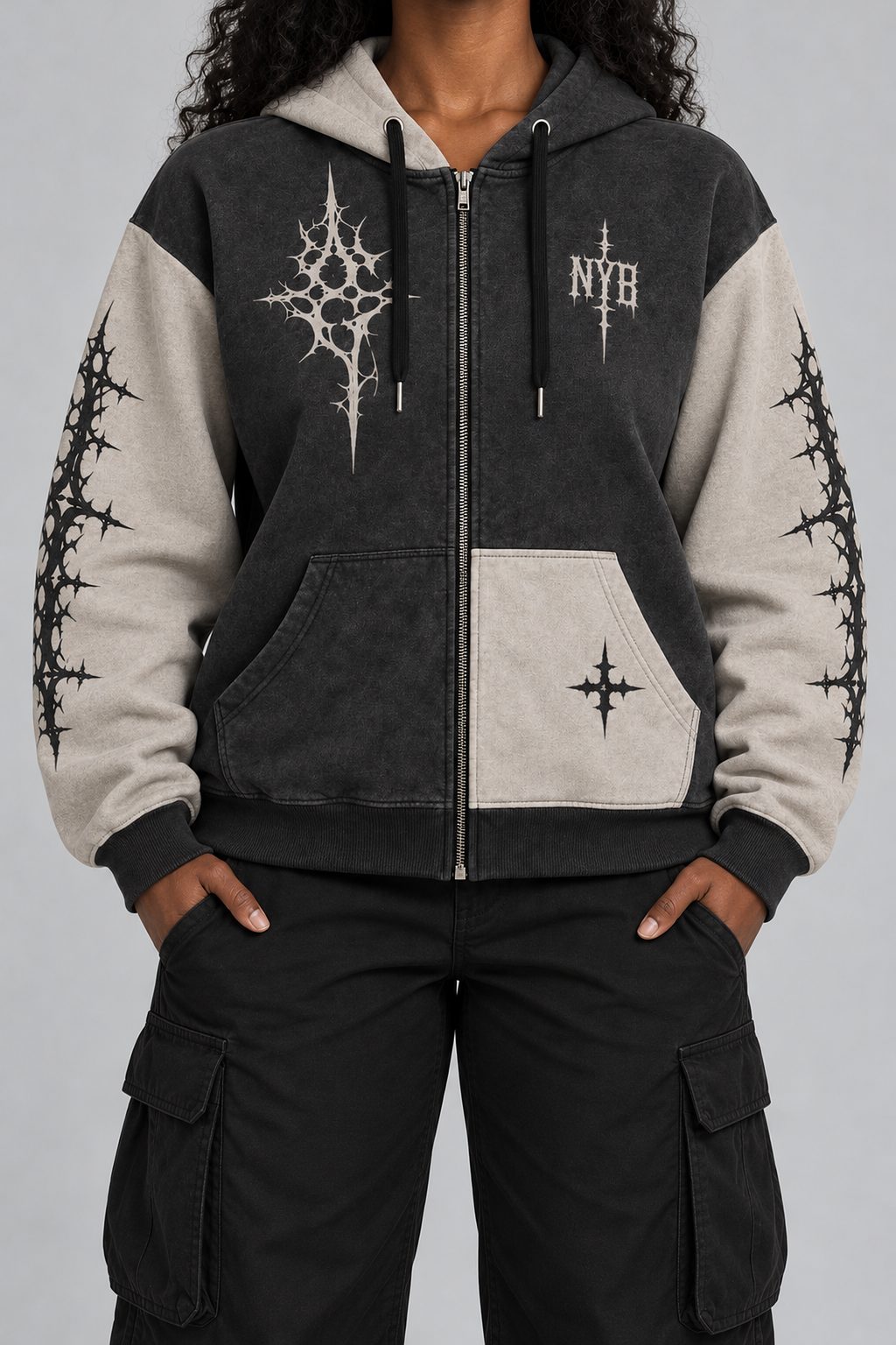 "DVDED" washed charcoal and stone zip hoodie, worn, front view, hands in pockets