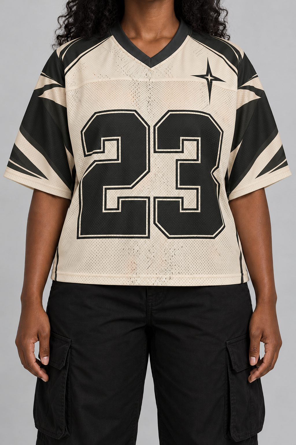 "ST VINCE" cream and black football jersey, worn, front view