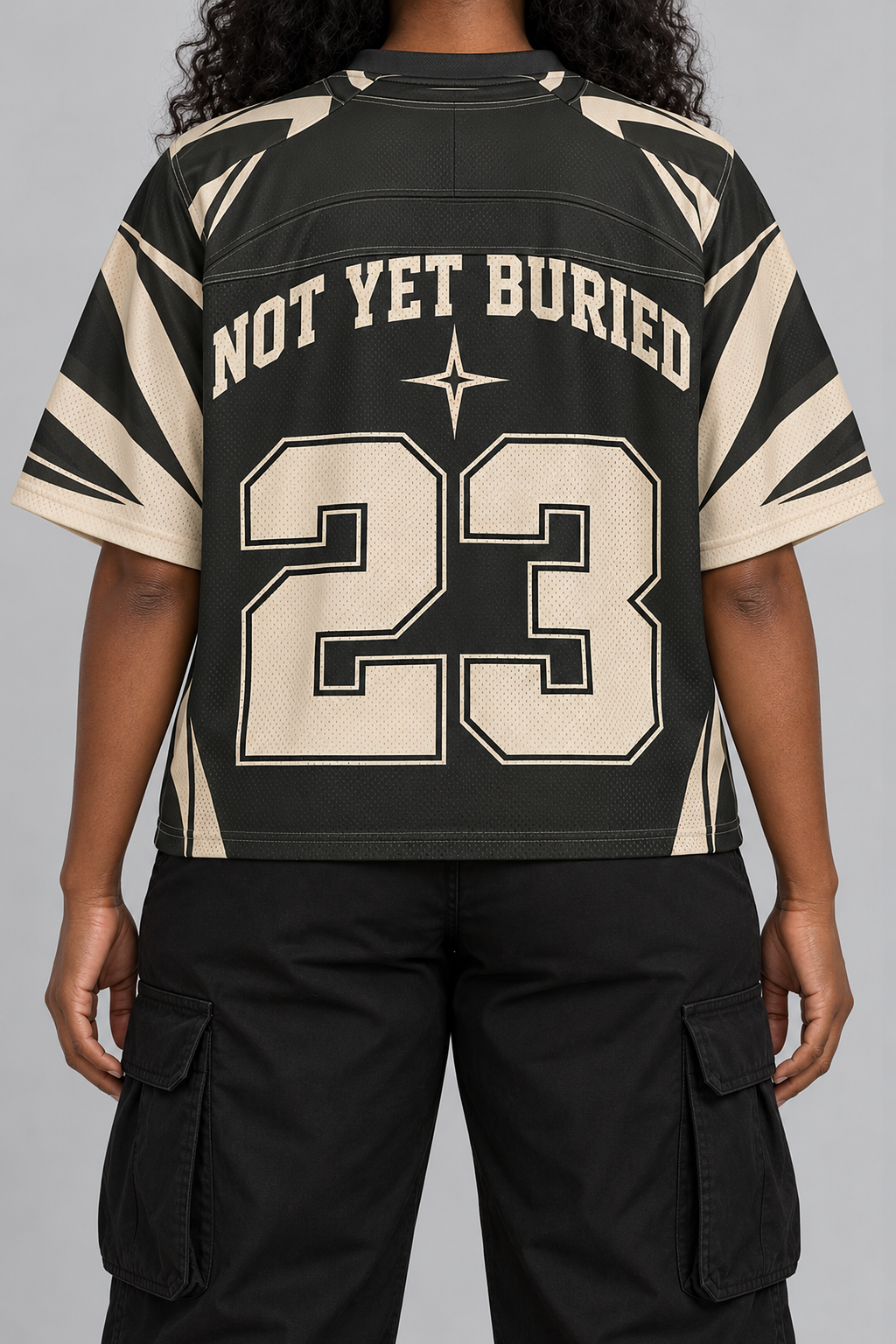 "ST VINCE" cream and black football jersey, worn, back view