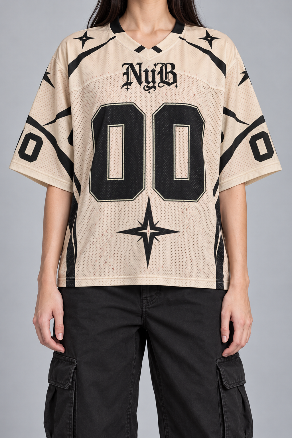 "NOUGHT" cream and black football jersey, worn, front view